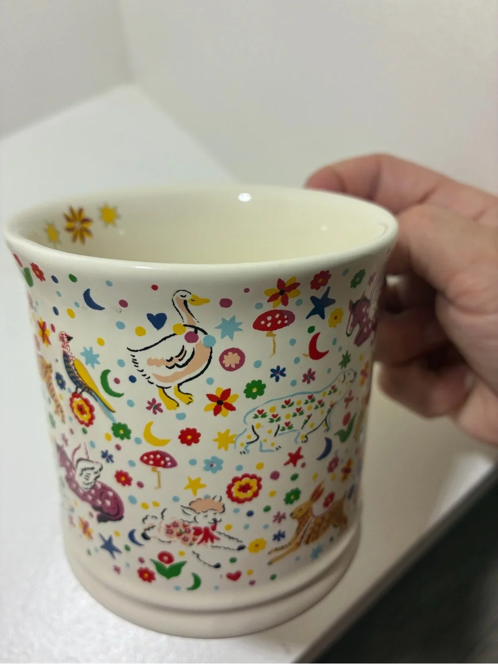 Whimsical Colorful Cartoon animals and floral Coffee Mug by Cath Kidston